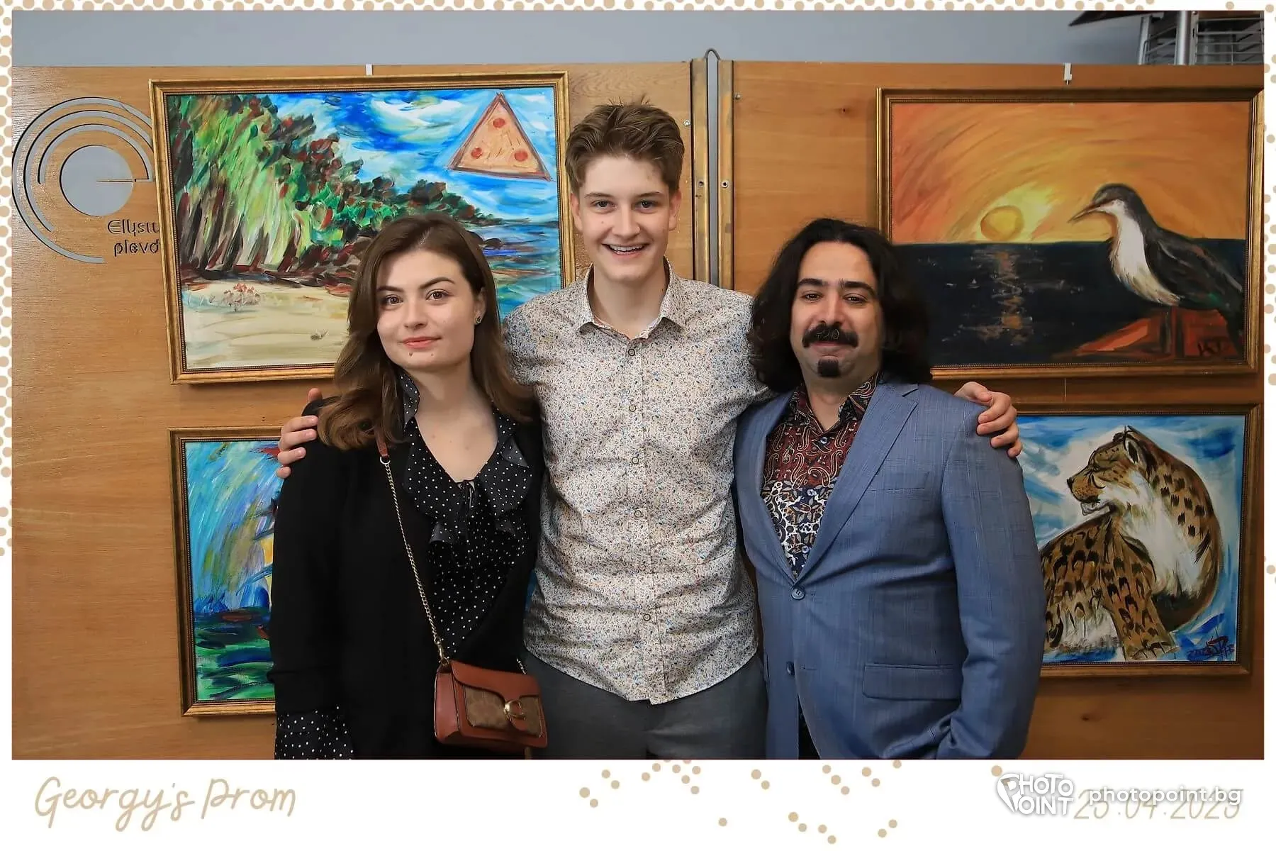 Prom guests in a hall with paintings