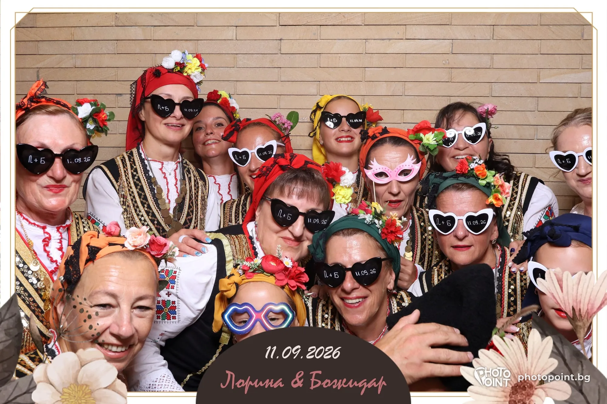 Guests with flower crowns and colourful glasses at a wedding