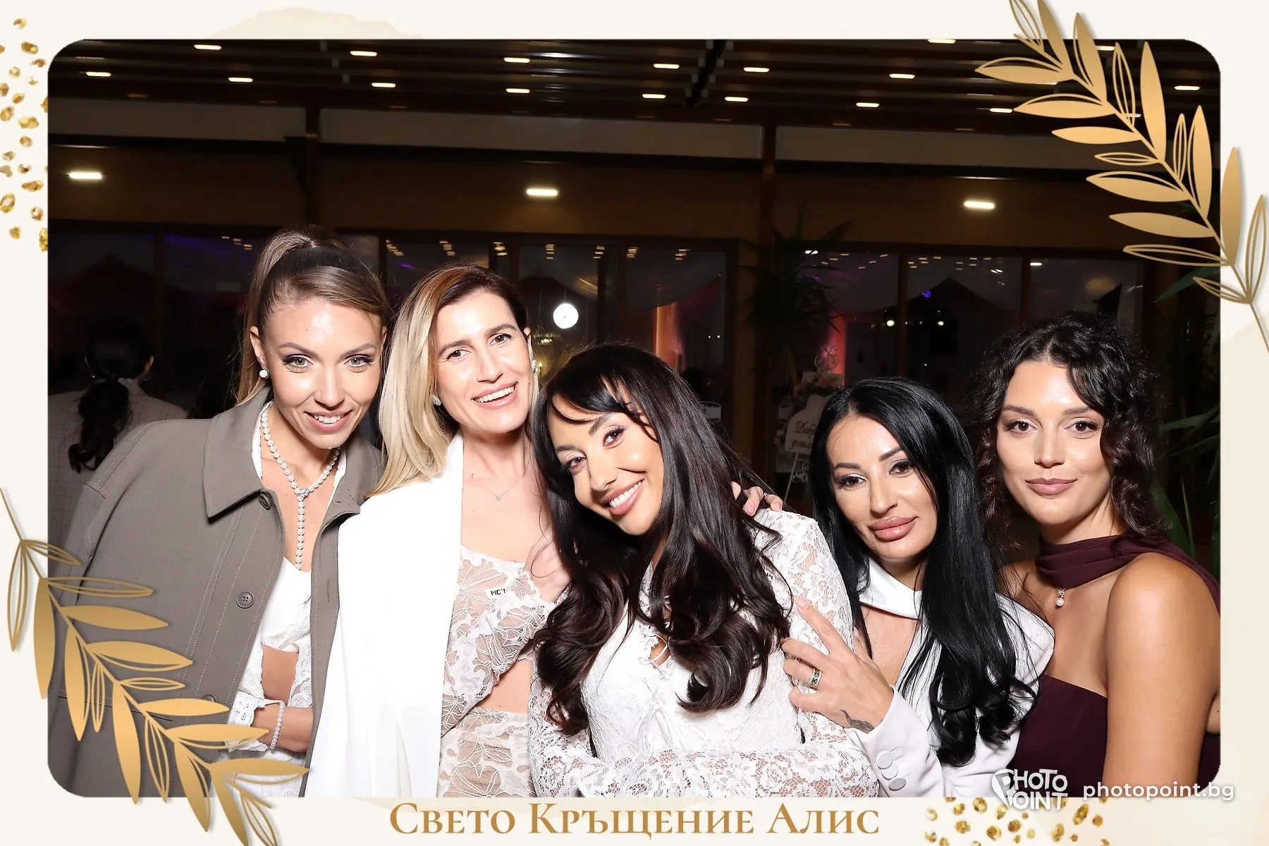 Guests posing at a christening in a gold photo frame